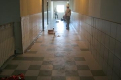 Construction Worker Doing Finishing Work Inside Building