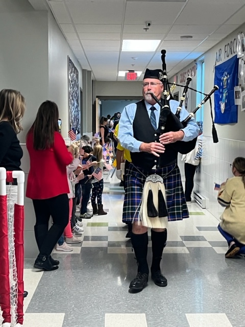 Andy Michaud, played the bagpipes